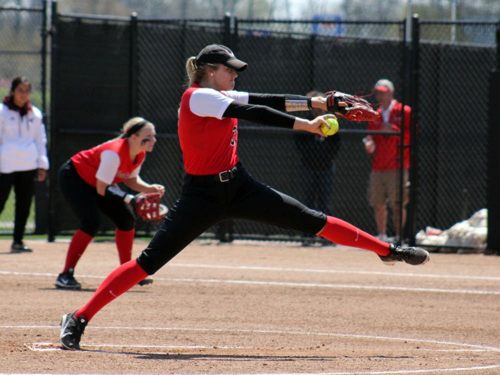 Sophomore Carolyn Wilmes attempts to pitch the ball in the game against Central Michigan at the Varsity Softball Complex on Saturday, April 23, 2016 DN PHOTO ALLYE CLAYTON