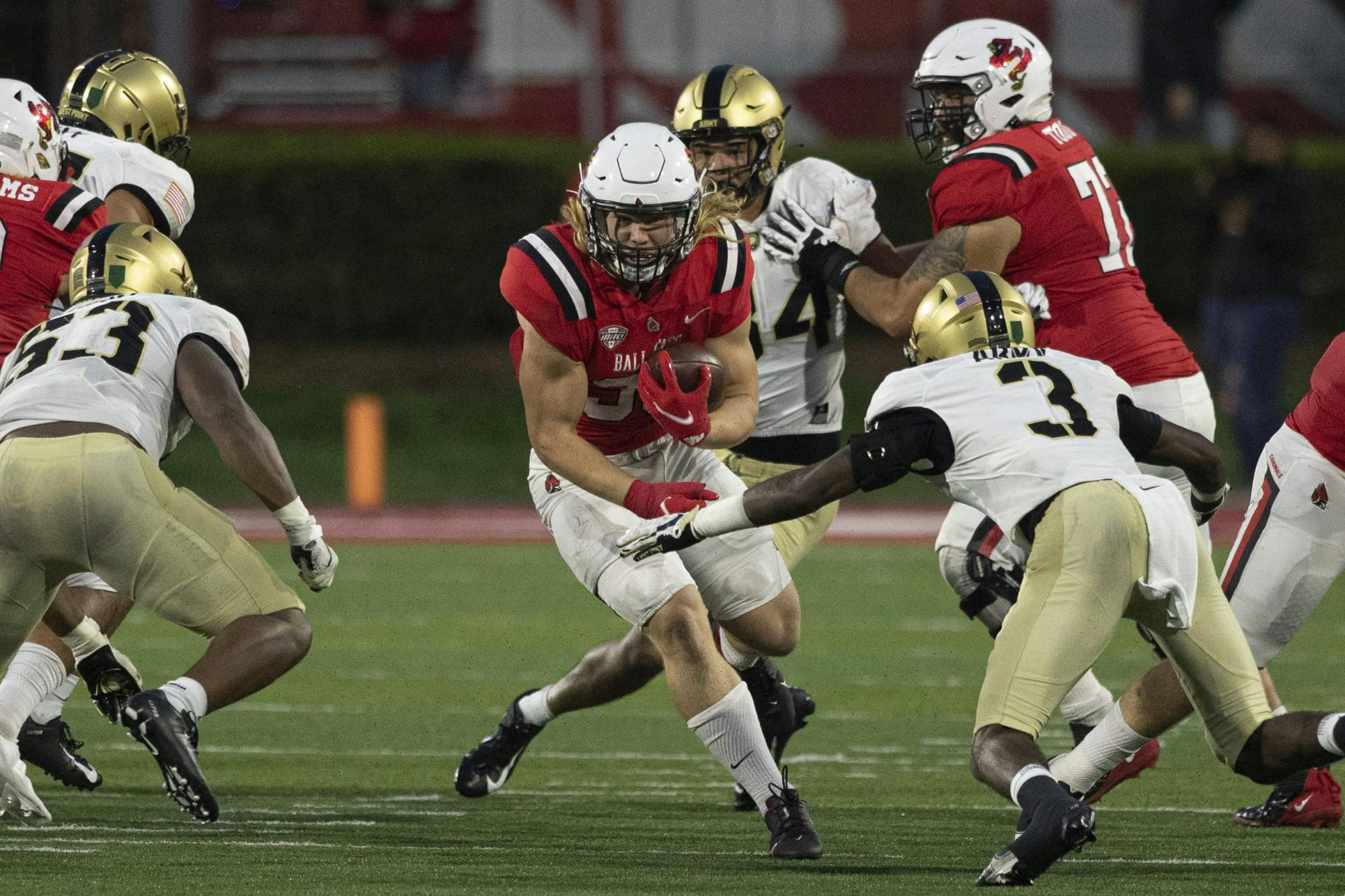 Cardinals freshman running back Carson Steele runs the ball Oct. 2, 2021, at Scheumann Stadium. The Cardinals beat the Black Knights 28-16. Jacob Musselman, DN