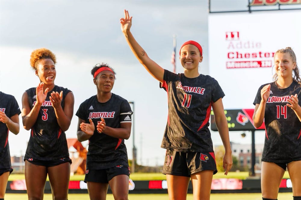 Addie Chester waives during introductions of a Louisville soccer game.  Addie Chester, photo provided