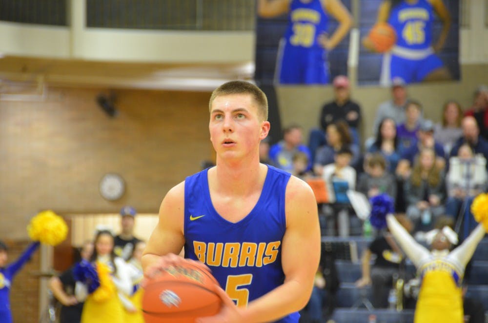 Burris senior Jackson Adamowicz prepares to take a free throw in a game against Blackford on Feb. 22 at Ball Gymnasium. The Owls fell to the Burins, 88-69. Jack Williams, DN