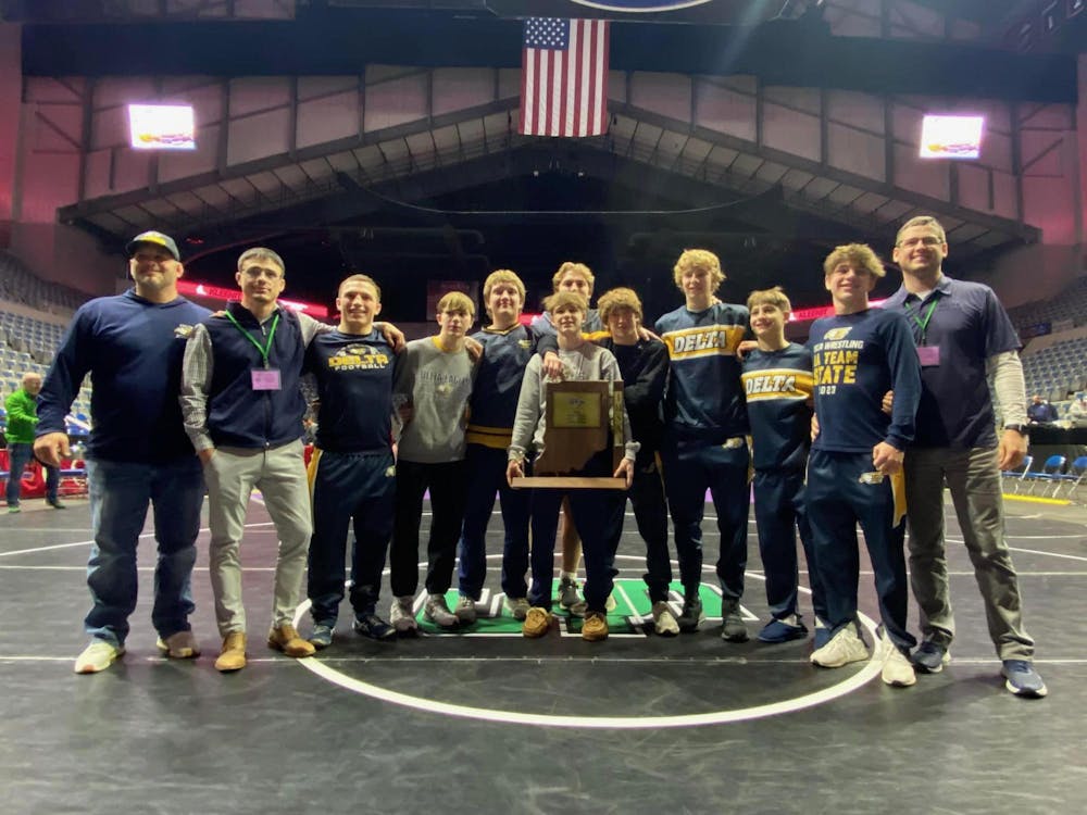 Delta wrestling poses Feb. 10 after winning the semi-state championship at the Allen County War Memorial Colliseum. Tilmon Clark, photo provided. 
