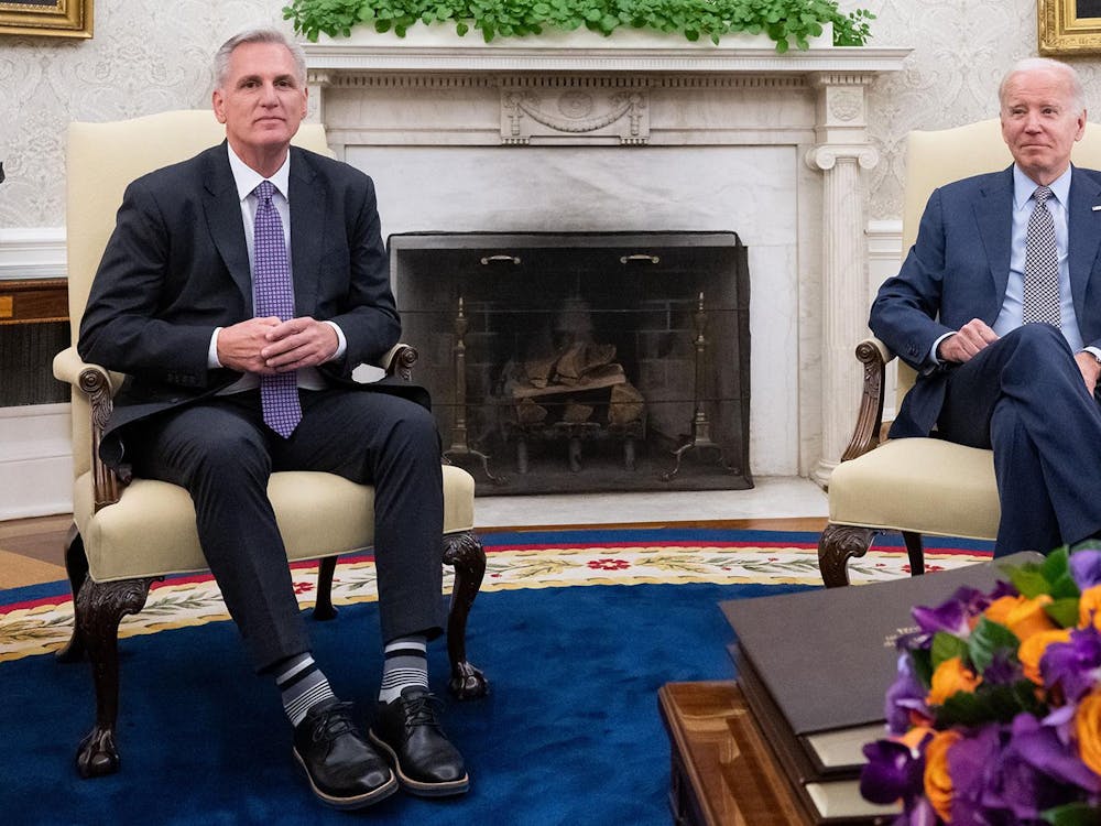 US President Joe Biden meets with US House Speaker Kevin McCarthy (R-CA) (left) about the debt ceiling, in the Oval Office of the White House in Washington, DC, on May 22, 2023. US President Joe Biden said he was "optimistic" as he met Monday with top Republican Kevin McCarthy for their first one-on-one talks in months, with just 10 days left to stop a calamitous debt default. (Saul Loeb/AFP via Getty Images/TNS)