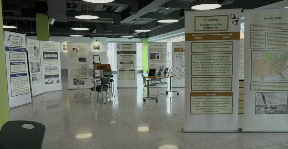 Pictured above: “Journey to Freedom” exhibit standing in Ivy Tech in Muncie.