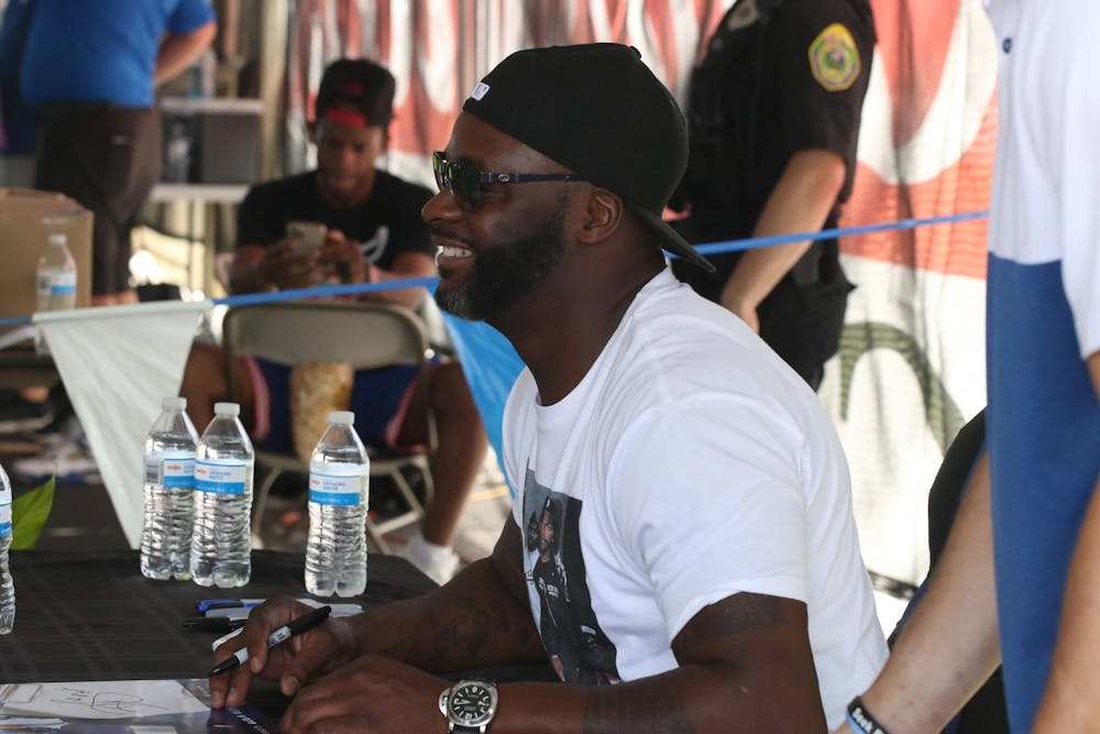 Indianapolis Colts great and receivers coach Reggie Wayne held an autograph  session at tent sale July 19 - Ball State Daily