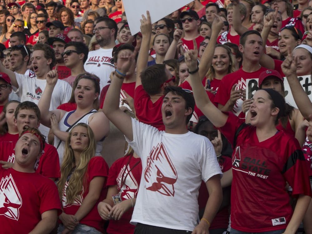 The crowd cheers during the football game against Virginia Military Institute on Sept. 3 at Schuemann Stadium DN PHOTO MAKAYLA JOHNSON