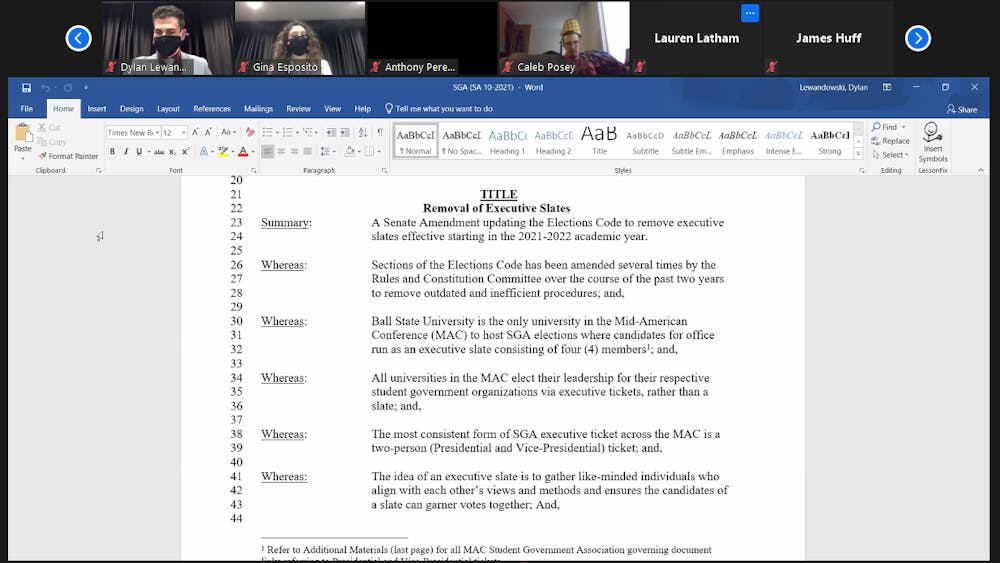 <p>Senators review the amendment proposing to eliminate slates in future SGA elections. The amendment passed 21-11, with two abstentions and narrowly passed the two-thirds majority vote. <strong>Maya Wilkins, Screenshot Capture</strong></p>