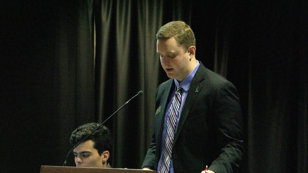 <p>Student Government Association Vice President Cameron DeBlasio reads a new resolution aloud to the senate Sept. 18 at the L.A. Pittenger Student Center . The resolution would require all Ball State restrooms to be equipped with sanitary dispensaries<strong>. John Lynch, DN</strong></p>