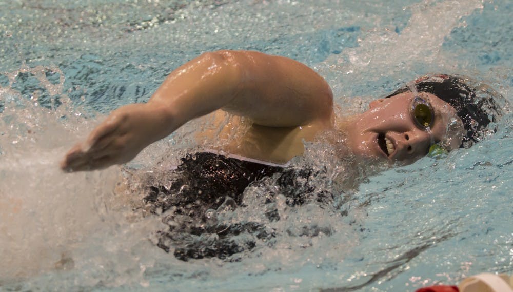 Junior Tracy Muszalski swims the 1000 yard freestyle against Bowling Green on Nov. 4 at Lewellen Aquatic Center. (DN PHOTO Terence K. Lightning Jr.)