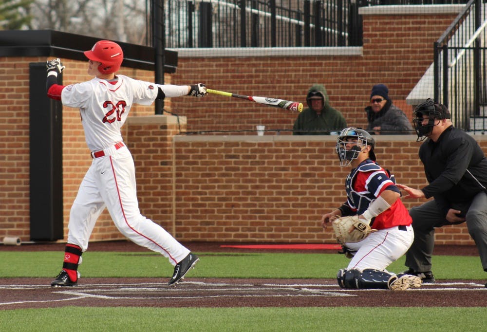 Freshman CJ Alexander attempts to hit the ball on Friday, March 18, 2016 at First Merchants Ballpark Complex. DN PHOTO ALLYE CLAYTON