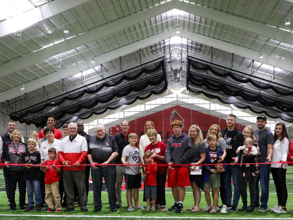 The Scheumann family, President Geoffrey Mearns, Beth Goetz and members of the Ball State community gathered to cut the ribbon at the Scheumann Family Indoor Practice Facility ribbon-cutting ceremony Saturday, October 2nd. Mearns said Scheumann embodied Ball State in all areas of his life. Daniel Kehn, DN