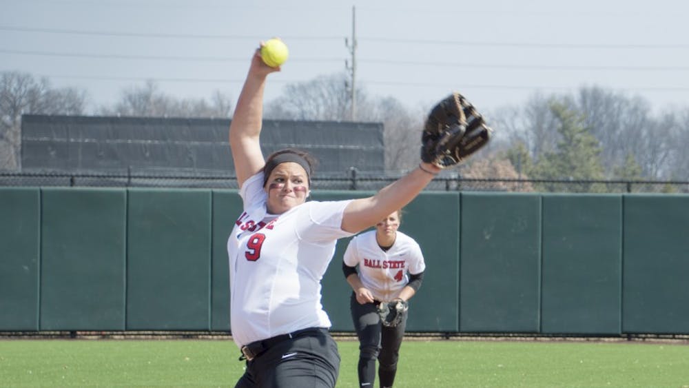 Junior pitcher Nicole Steinbach pitches the ball during the first game of the double header against Western Kentucky at First Merchants Ballpark Complex on March 21. DN PHOTO ALAINA JAYE HALSEY