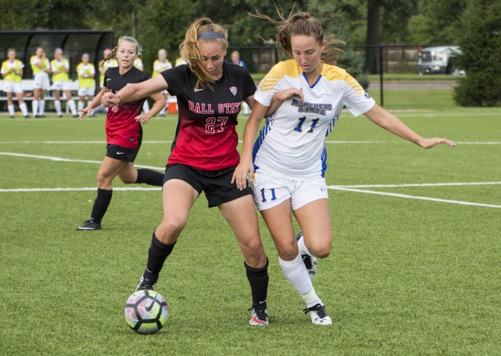 Chay McNitt, a midfielder for the Ball State soccer team, tries to steal the ball from Morehead State's midfielder Katie Quinn during the game on Sept. 16 at the Briner Sports Complex. Ball State won 4-0. Grace Ramey // DN