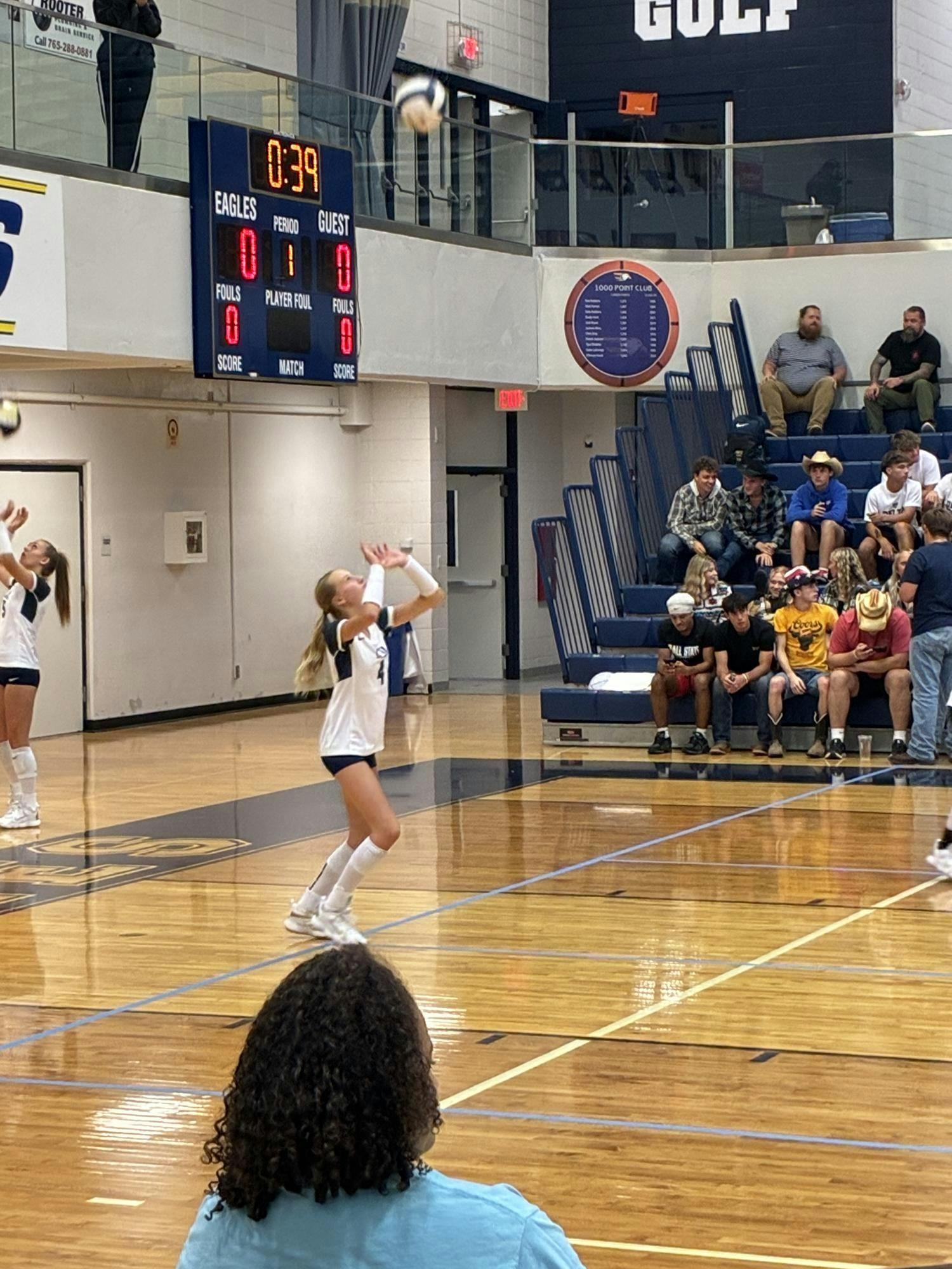 Delta’s No. 4 serves during the opening set against Alexandria-Monroe. The Eagles relied on strong service runs throughout the night to secure the Senior Night victory. Photo by Jacquelen Madden
