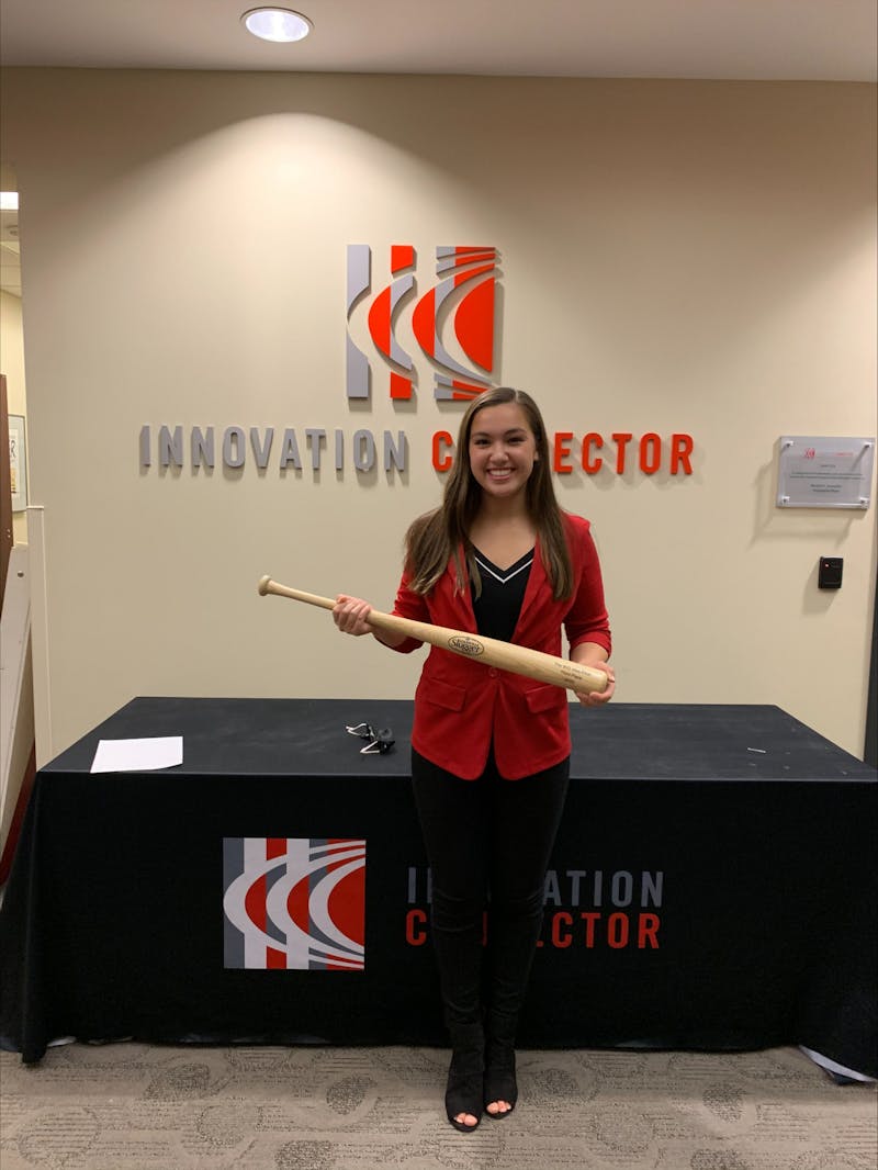 Teah Mirabelli, fourth-year theatre major, holds a bat representing her win at the Big Idea Pitch. Mirabelli got third place in the pitch for her magnetic nail business Nov. 2020. Teah Mirabelli, Photo Provided.