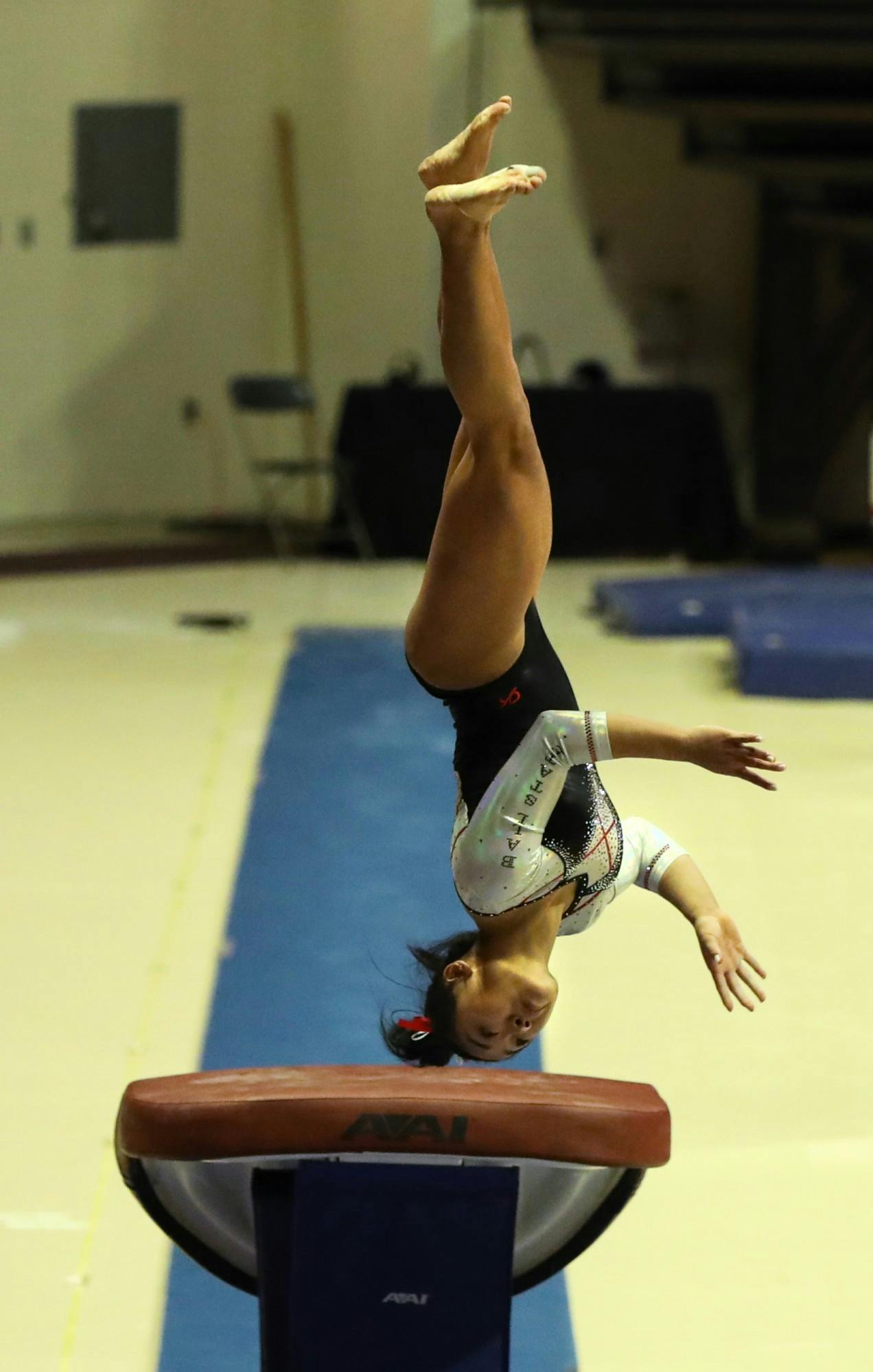 Sophomore Suki Pfister performs her vault routine Jan. 23 at Worthen Arena. Pfister earned a score of 9.900 for this event. Rylan Capper, DN 