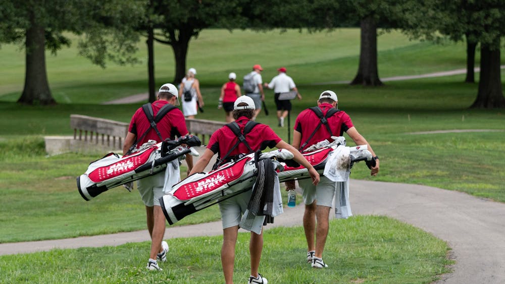 Members of the Ball State Men&#x27;s Golf Team walk towards the fairway after teeing off from the second hole at the Earl Yestingmeier Invite Sep. 3 at the Delaware Country Club. Ball State started the day trailing Wright State by 5 strokes. Eli Houser, DN