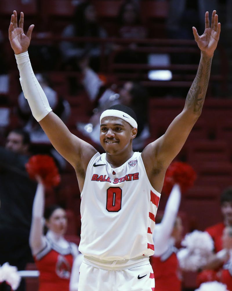 Redshirt-junior guard Jarron Coleman celebrates Ball State defeating Kent State Feb. 21 at Worthen Arena. Coleman scored nine points during the game. Amber Pietz, DN