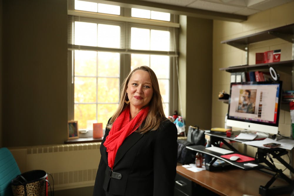 Jennifer Rathbun poses for a photo in her office Nov. 16 in the North Quad Building. Rathbun has worked for the university since July 2021. Rylan Capper, DN. 