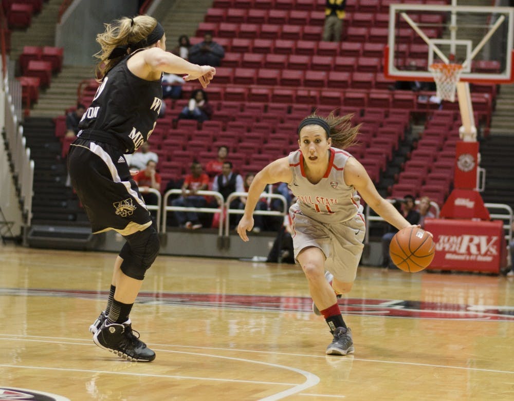 Senior guard Brandy Woody drives the ball down the court in the second half against Western Michigan on Jan. 29 at Worthen Arena. Woody scored 21 points in the 56-43 win. DN PHOTO BREANNA DAUGHERTY