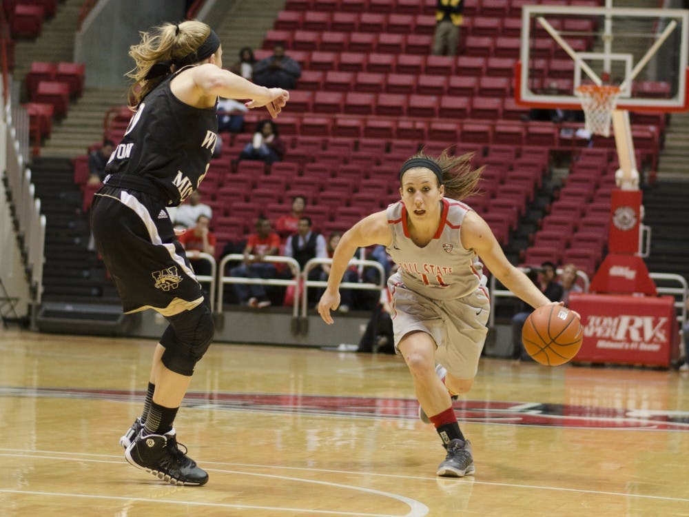Senior guard Brandy Woody drives the ball down the court in the second half against Western Michigan on Jan. 29 at Worthen Arena. Woody scored 21 points in the 56-43 win. DN PHOTO BREANNA DAUGHERTY