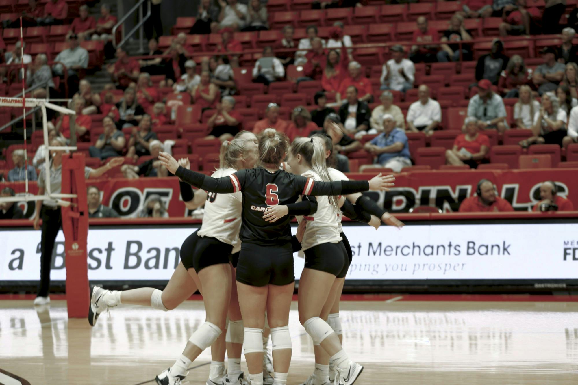 The Ball State Women's Volleyball team celebrates scoring a point over Arkansas State at Worthen Arena Sept. 9. Ball State swept Arkansas State. Caroline Stalvey, DN