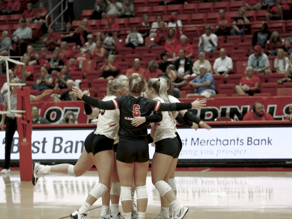 The Ball State Women's Volleyball team celebrates scoring a point over Arkansas State at Worthen Arena Sept. 9. Ball State swept Arkansas State. Caroline Stalvey, DN