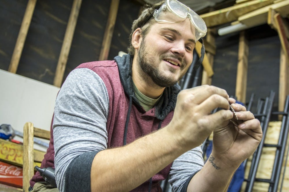 <p>Ball State alumnus Aaron Camino runs a spoon jewelry business called Aaron Paul Designs. He does most of his work in a small shed a few feet from his home in Muncie, Indiana.</p>