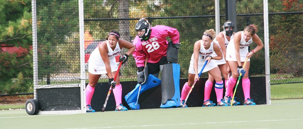 Team mates help goalkeeper Shelby Henley protect the goal in the game against Michigan State on Oct. 12 at the Briner Sports Complex. DN PHOTO KAITI SULLIVAN