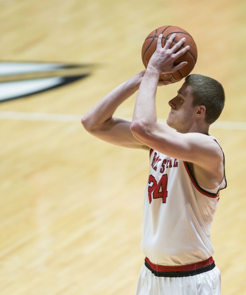 Junior guard Sean Sellers attempts to get a three-point shot during the game against Western Michigan Jan. 28 at John E. Worthen Arena. Breanna Daugherty // DN
