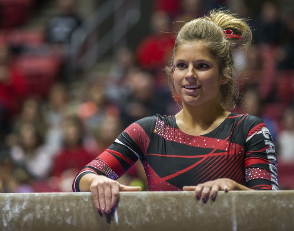 Junior Baylee Bell prepares to start her routine on the balance beam during the meet against Northern Illinois on Jan. 15 at Worthen Arena. Breanna Daugherty // DN