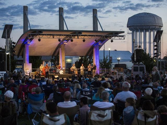 Concert-goers watch the Lost Bayou Ramblers perform in Canan Commons Park, July 10, 2021, as part of the Muncie Three Trails Music Series. The music series is free, which founder and organizer Richard Zeigler said is unique for a city of Muncie&#x27;s size. Richard Zeigler, Photo Provided
