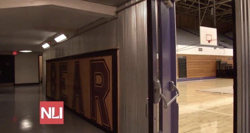 The Muncie Fieldhouse restoration project is complete. The parts of the original wood floor was saved and transformed into a ledge. This picture of the preserved wood floor was taken on Nov. 19. 
