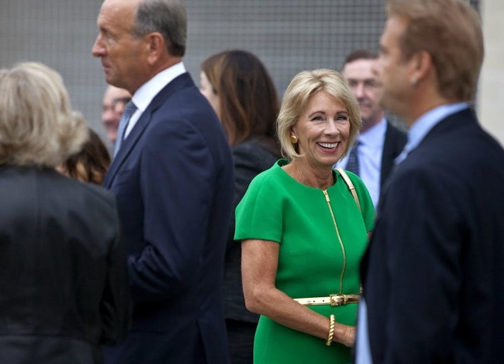 <p>U.S. Education Secretary Betsy DeVos arrives at the dedication ceremony of Michigan State University’s new Grand Rapids Medical Research Center on Wednesday, Sept. 20, 2017, in Grand Rapids, Mich. <strong>Associated Press, Photo Provided</strong></p>