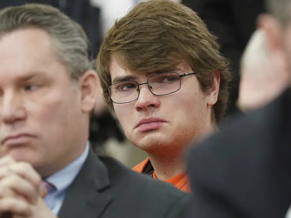 Payton Gendron sheds tears as he listens to impact statements during his sentencing for charges including murder and domestic terrorism motivated by hate in an Erie County court room in Buffalo, N.Y., on Wednesday, Feb 15, 2023. Gendron, a white supremacist who killed 10 Black people at a Buffalo supermarket was sentenced to life in prison without parole. (Derek Gee/The Buffalo News via AP, Pool)