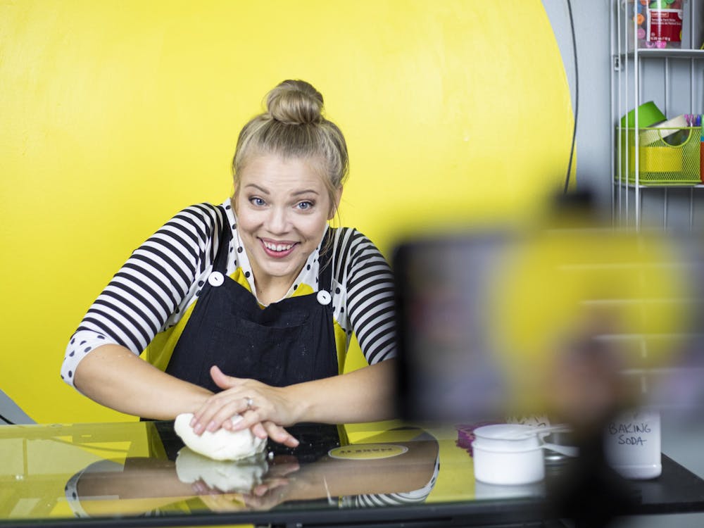 Kylee Larson, kids art YouTuber, kneads material to make letter molds Sept. 21, 2021, at her home in Indianapolis. Her YouTube channel Kylee Makes It is about incorporating a creative element with whatever kids are interested in. Jacob Musselman, DN