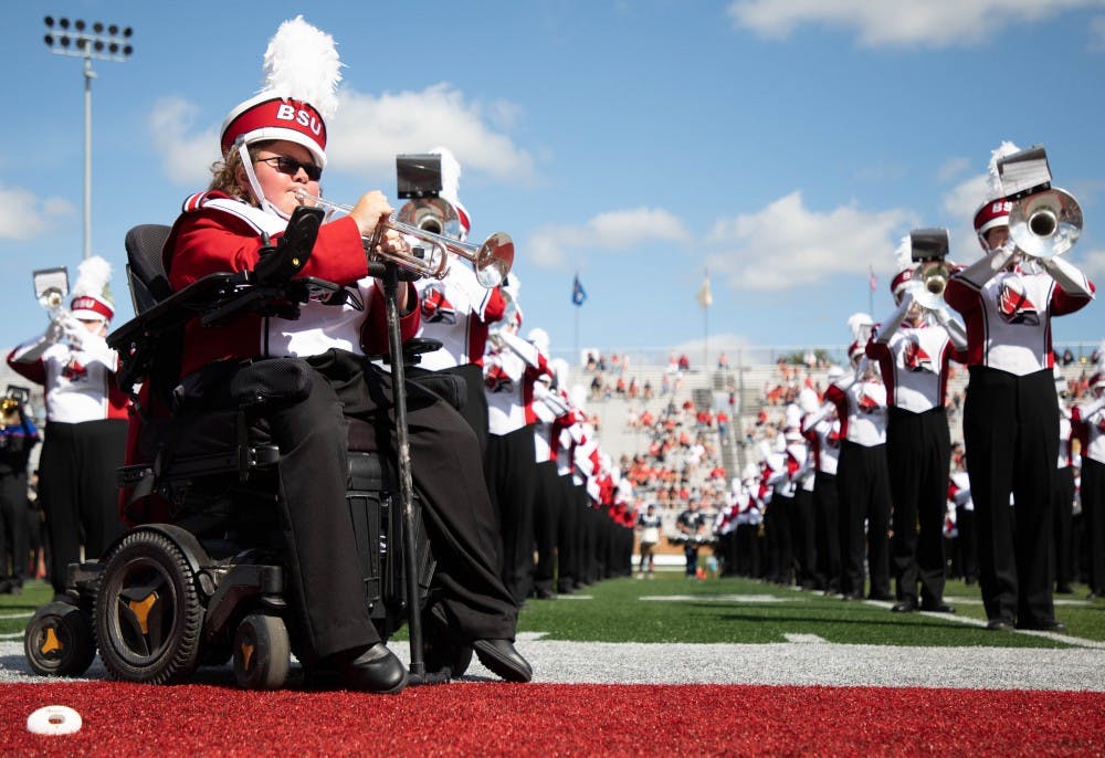 Freshman trumpet player Ethan Atterson plays with the Pride of Mid-America during half time at a football game Sept. 7, 2019, at Scheumann Stadium. "Ball State has a really positive and supportive environment. The band is fun" said Atterson, who has played the trumpet for seven years. Rebecca Slezak, DN