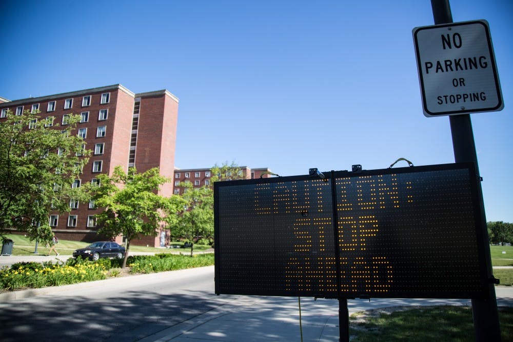 <p>New stop signs have been added as a precaution during the demolition of the LaFollette Complex. <em>Reagan Allen // DN</em></p>