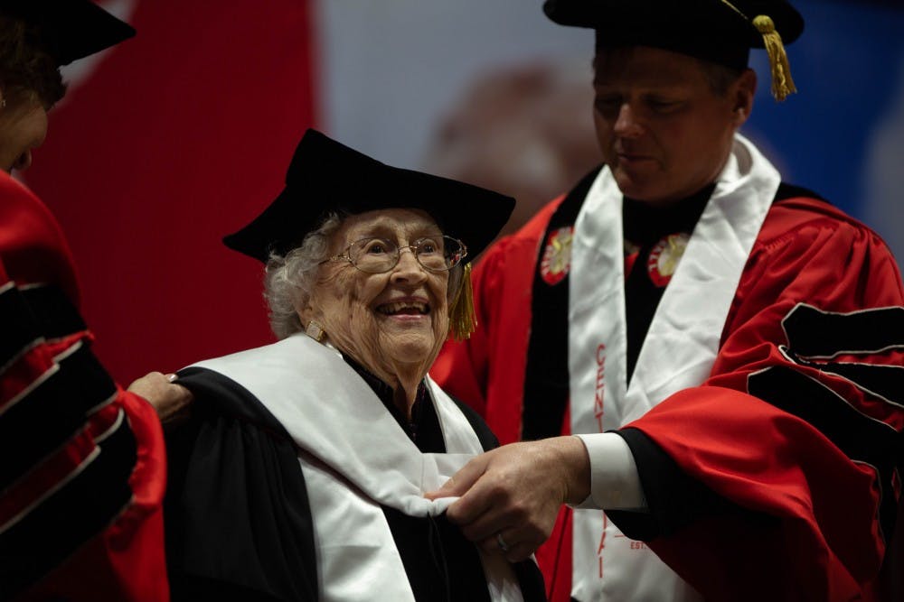 <p>Lucina Ball Moxley receives an honorary Doctor of Arts degree during the spring 2019 commencement May 4, 2019, in John E. Worthen Arena. Moxley, 100, is the granddaughter of William C. Ball, one of the five Ball Brothers who established Ball State. <strong>Scott Fleener, DN</strong></p>