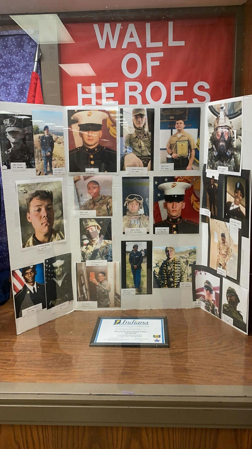 <p>Muncie Central High School&#x27;s (MCHS) &quot;Wall of Heroes&quot; display, depicting former students who went onto serve in the military. MCHS was designated a Purple Star school in 2021 by the Indiana Department of Education for its programs and services honoring veterans and their families. Richard Kann, DN</p>