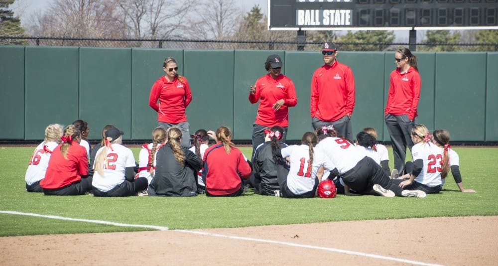 Ball State head coach Tyra Perry talks to the softball team after the first game of the double header against Western Kentucky at First Merchants Ballpark Complex on March 21. DN PHOTO ALAINA JAYE HALSEY