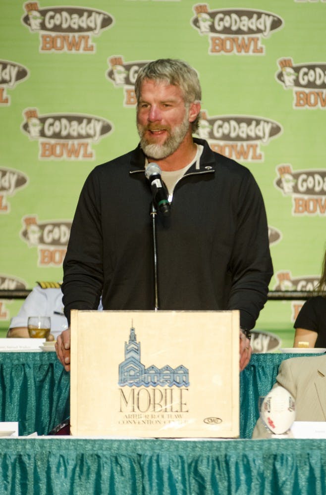 Guest speaker Brett Favre speaks to the crowd at the mayor's luncheon Jan. 3 at the Mobile Convention Center in Mobile, Ala. Members of the community came out for a brief lunch and to listen to high ranking officials talk about the bowl, scholarship recipients and Champion of Life honorees. DN PHOTO COREY OHLENKAMP