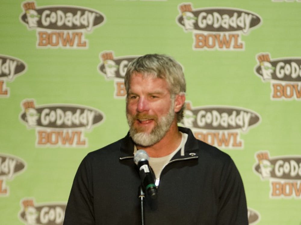 Guest speaker Brett Favre speaks to the crowd at the mayor's luncheon Jan. 3 at the Mobile Convention Center in Mobile, Ala. Members of the community came out for a brief lunch and to listen to high ranking officials talk about the bowl, scholarship recipients and Champion of Life honorees. DN PHOTO COREY OHLENKAMP