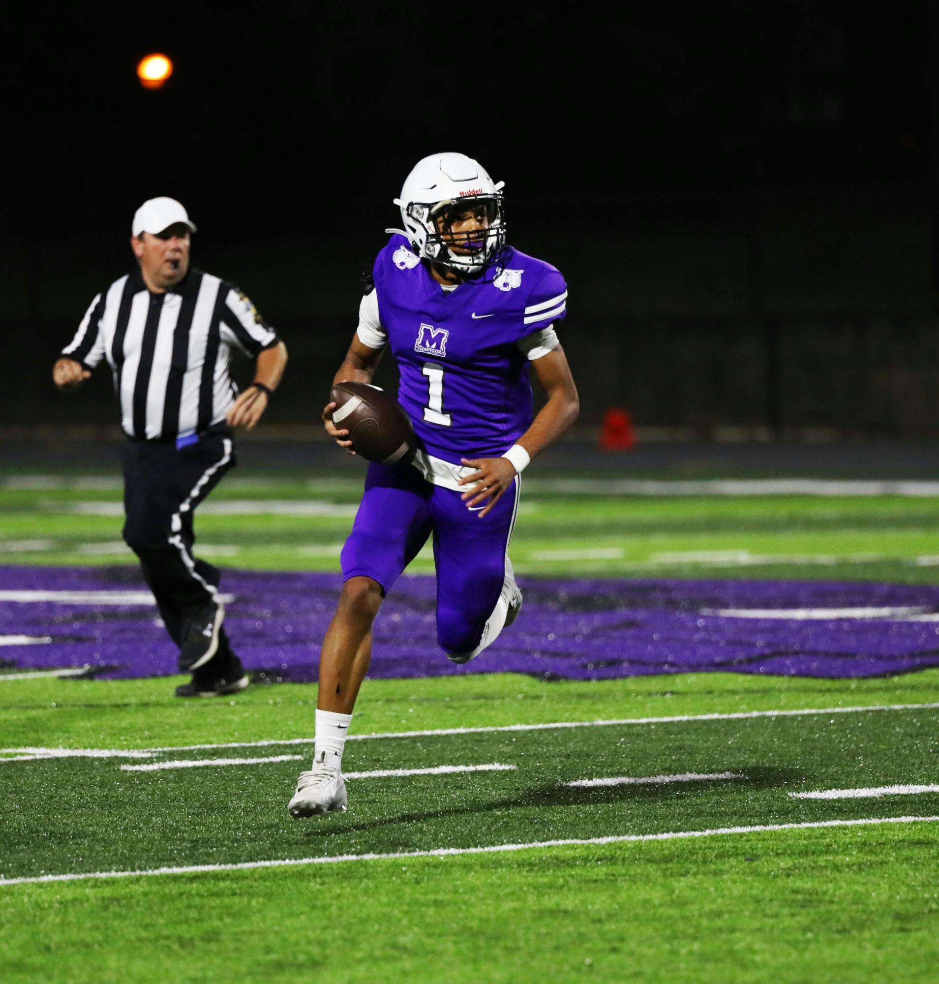 Muncie Central senior Leo Boyd runs the ball against Arsenal Tech Oct. 13 at Muncie Central High School. Mya Cataline, DN