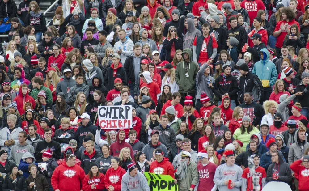 Fans stand in the Nest to cheer on the football team during the game against Toledo on Oct. 2 at Scheumann Stadium. DN PHOTO BREANNA DAUGHERTY
