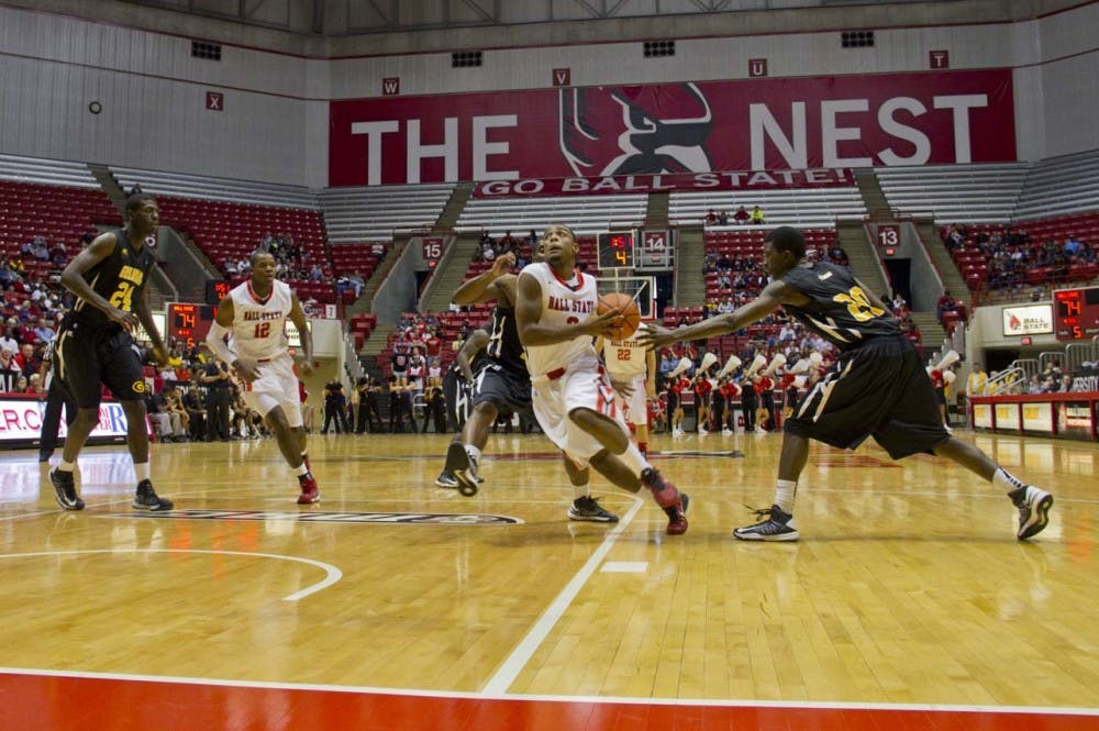 Guard Marcus Posley goes in for the Ball State layup. DN PHOTO EMMA FLYNN