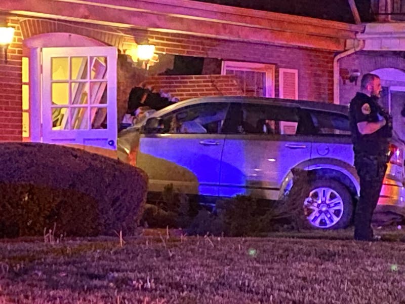 A car crashed into an apartment on the intersection of Riverside and Linden Street April 16 in Muncie, Ind. Elissa Maudlin, DN﻿
