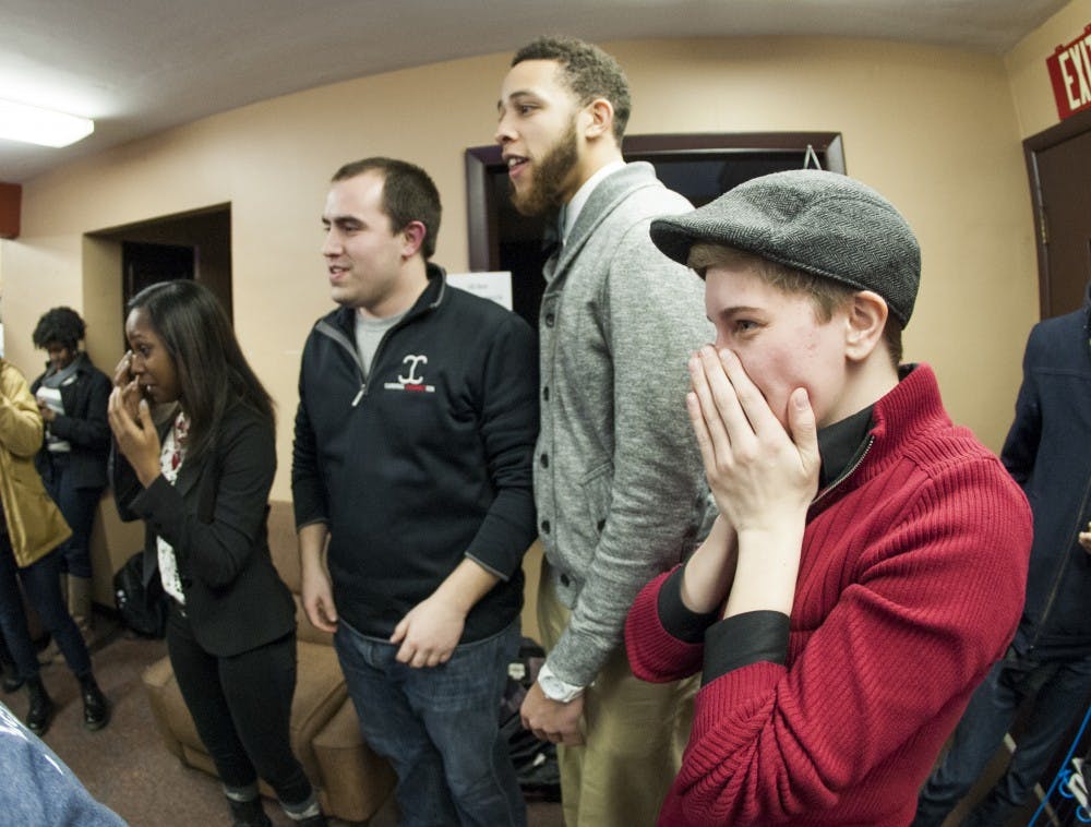 Cardinal Connection reacts to the news that they won the Student Government Association executive board election Feb. 25. Cardinal Connection won with 1,441 votes. DN PHOTO JONATHAN MIKSANEK