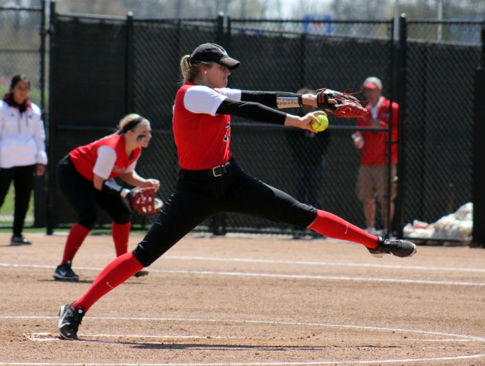 <p>Senior right hander Carolyn Wilmes winds up for the pitch in the game against Central Michigan at the Softball Field at First Merchants Ballpark Complex on April 23 last season. <strong>Allye Clayton, DN File</strong></p>