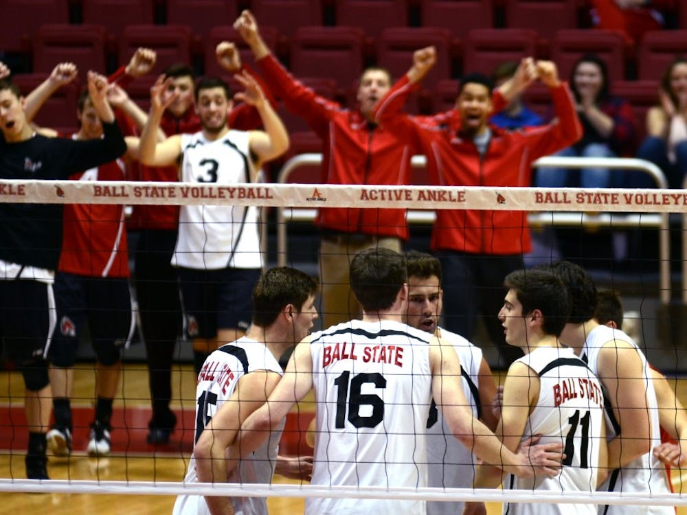 Members of the men's volleyball team react on the sideline during the match against Harvard on Jan. 15 at Worthen Arena. DN PHOTO EMMA ROGERS