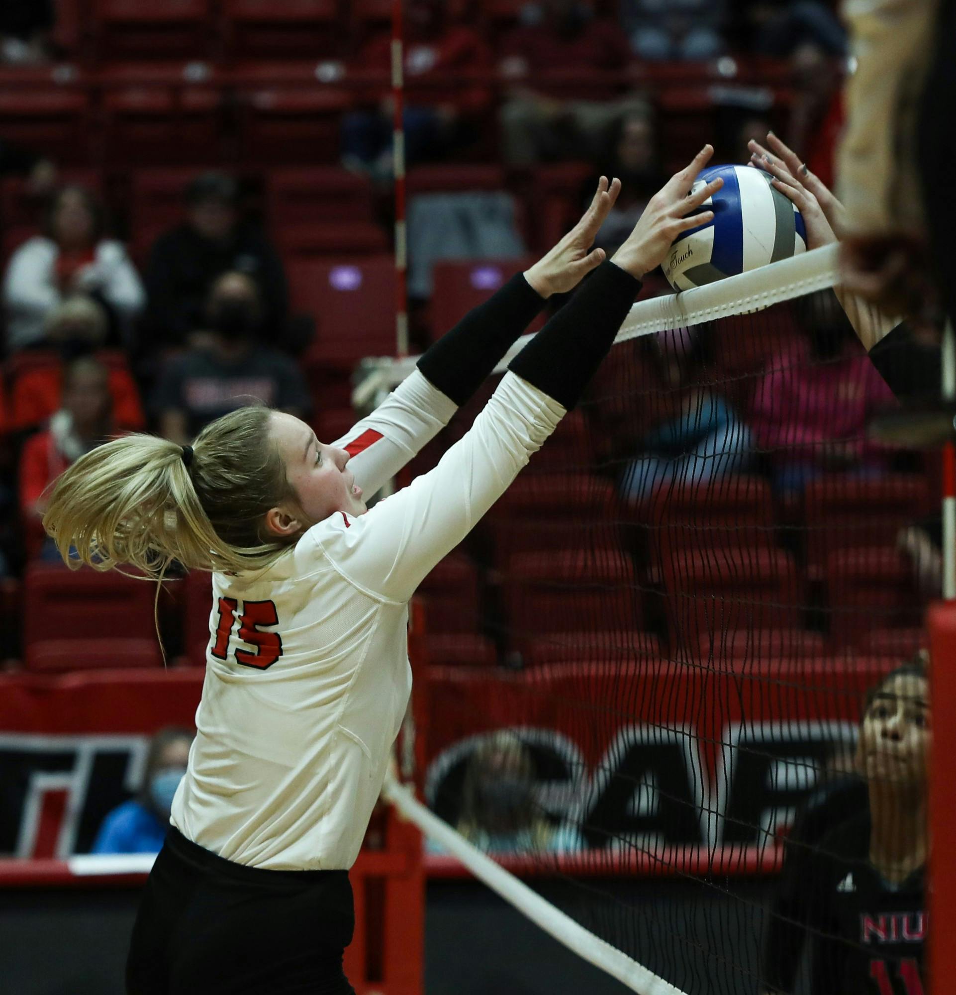 Freshman setter Megan Wielonski (15) blocks the ball against Northern Illinois at Worthen Arena Oct. 16. Ball State will take on Toledo at Worthen Arena Oct. 19. Jacy Bradley, DN